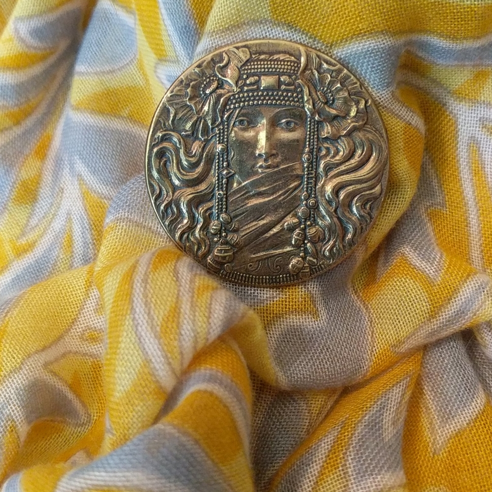Woman's goddess necklace on black silk cord